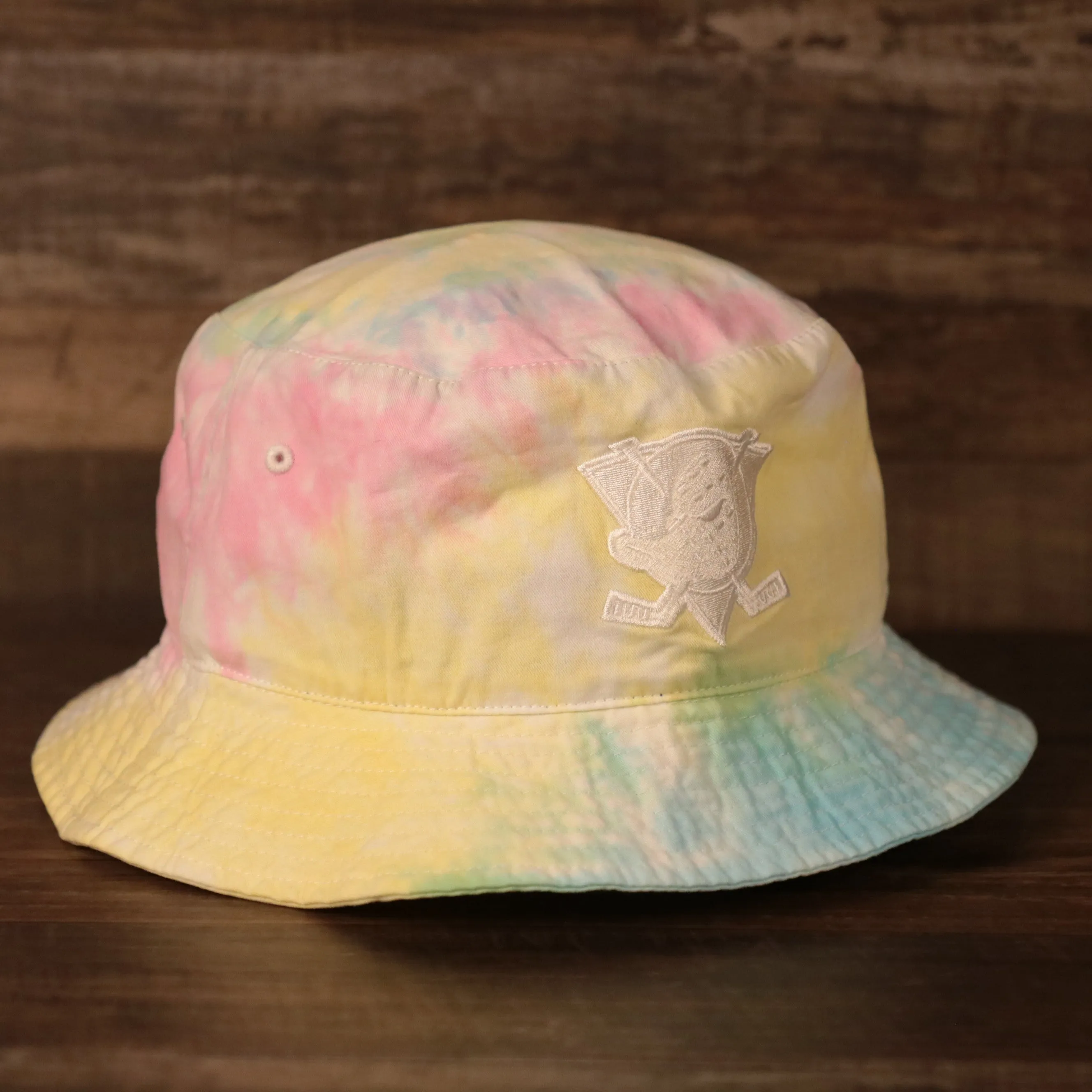 Anaheim Ducks bucket hat with tie dye design and Ducks logo patch on the front - One size fits most (OSFM).