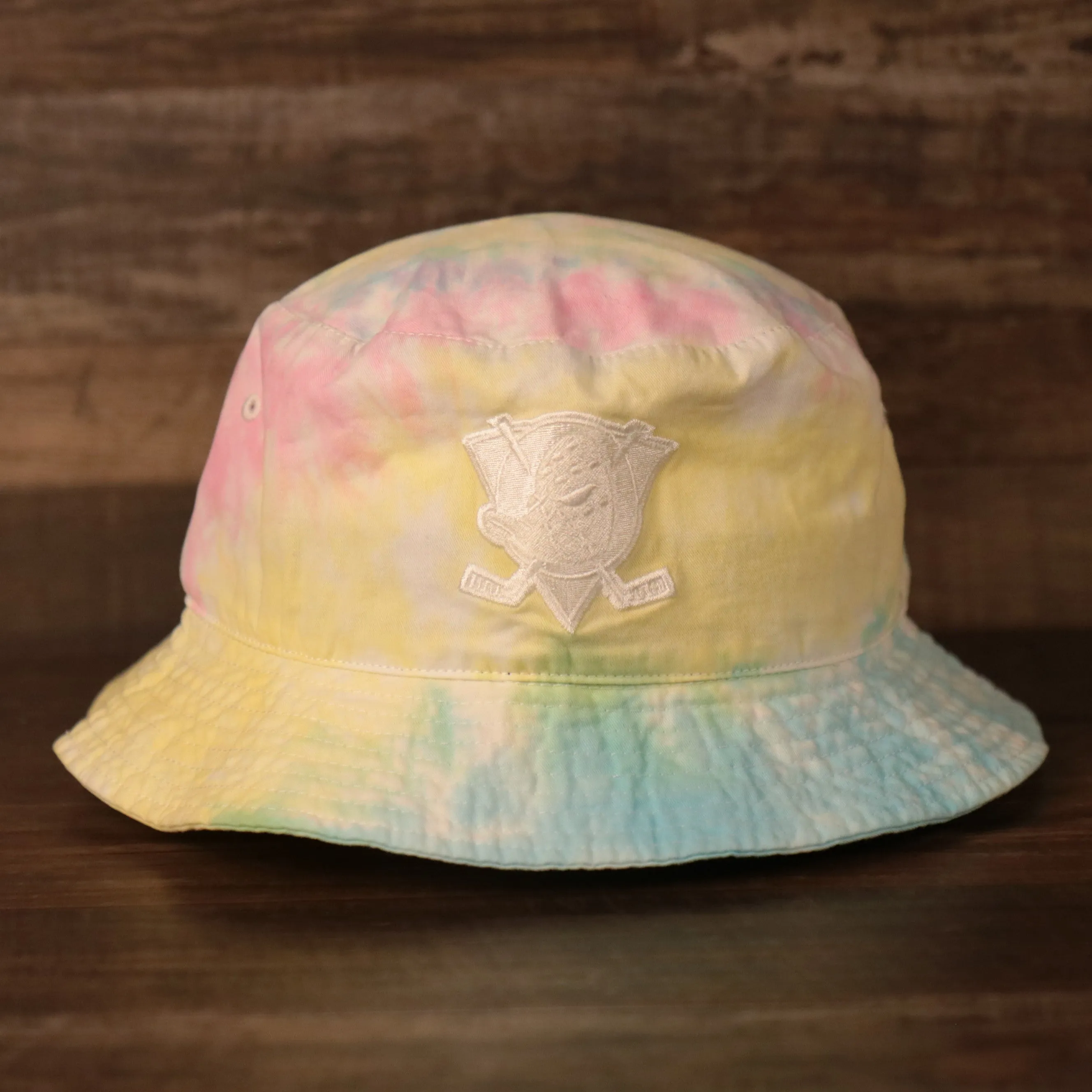 Anaheim Ducks bucket hat with tie dye design and Ducks logo patch on the front - One size fits most (OSFM).