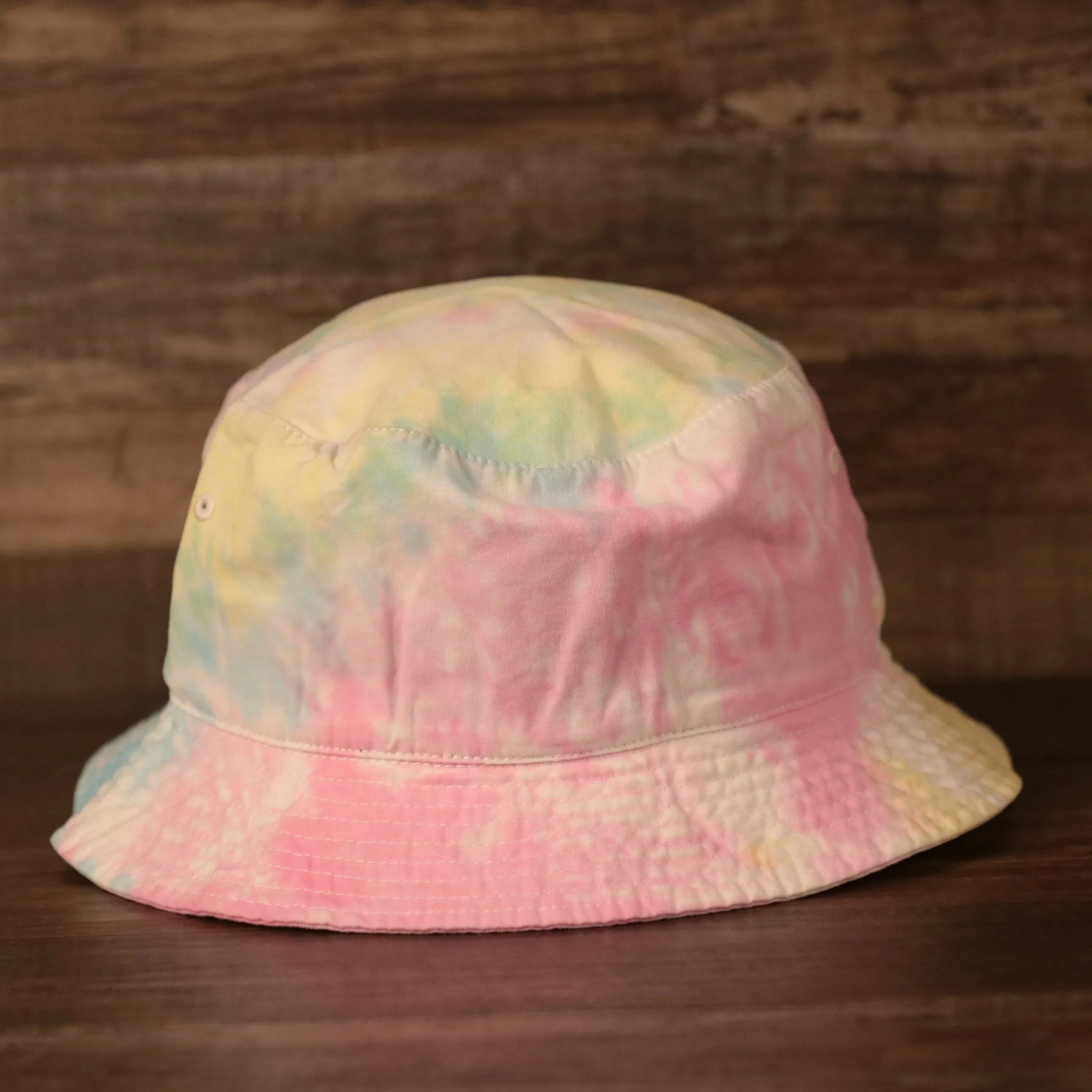 Anaheim Ducks bucket hat with tie dye design and Ducks logo patch on the front - One size fits most (OSFM).