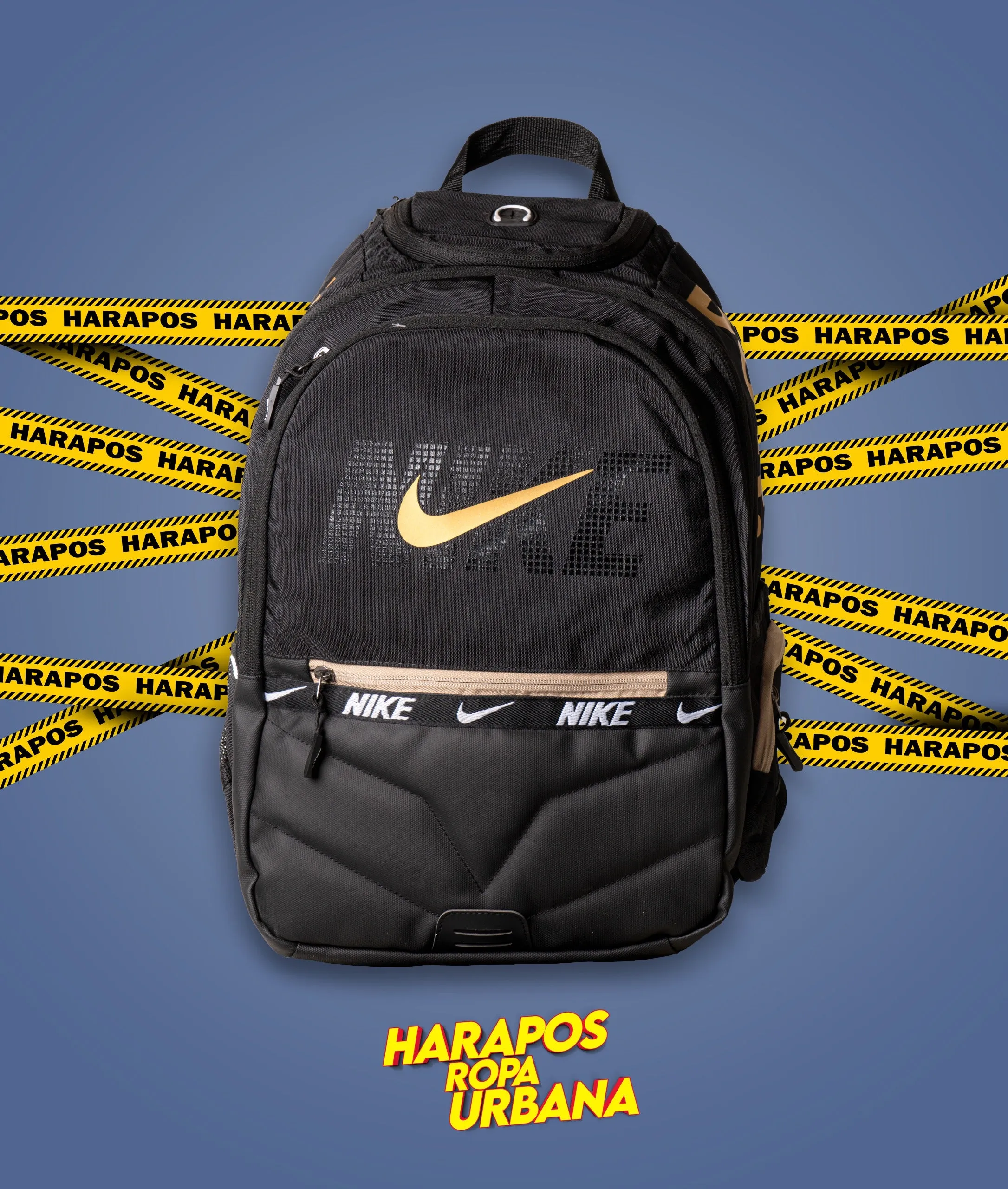 Nike black padded reinforced backpack with gold closure.