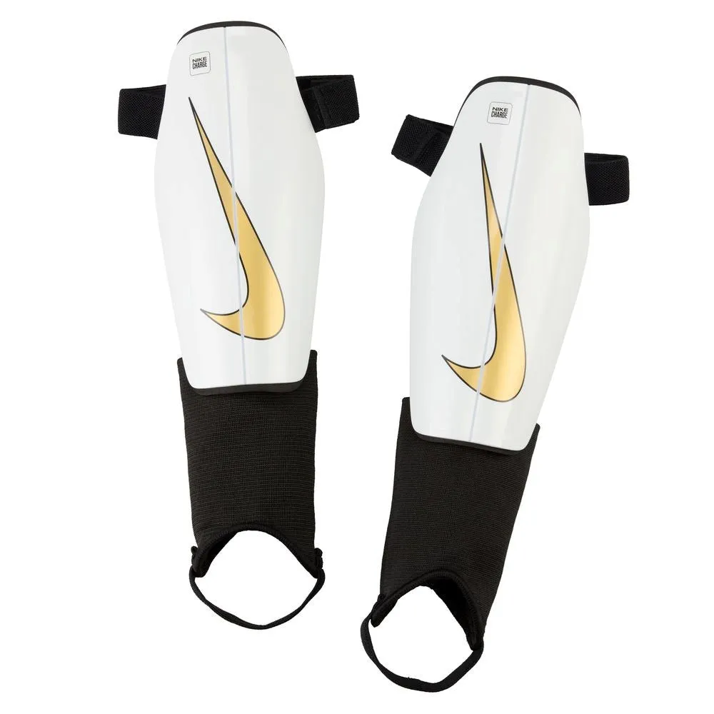 Nike Charge Shin Guards - White, Black, Metallic Gold.