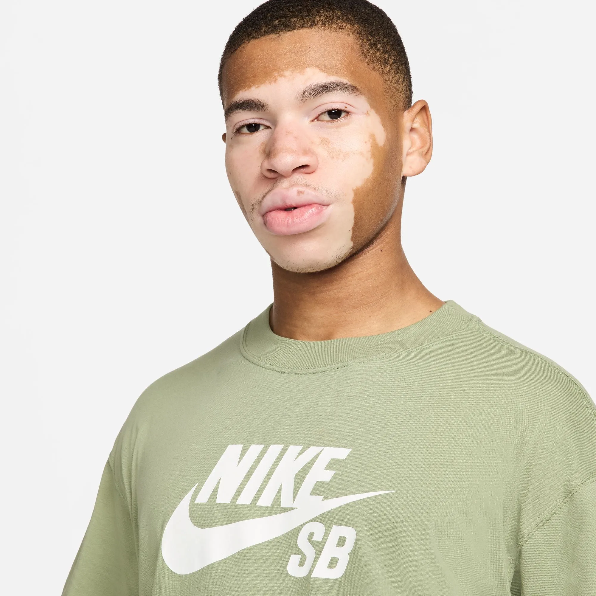 Nike SB Tee Logo HBR Oil Green can be rewritten as Nike SB Oil Green Logo HBR Tee for improved Google SEO.