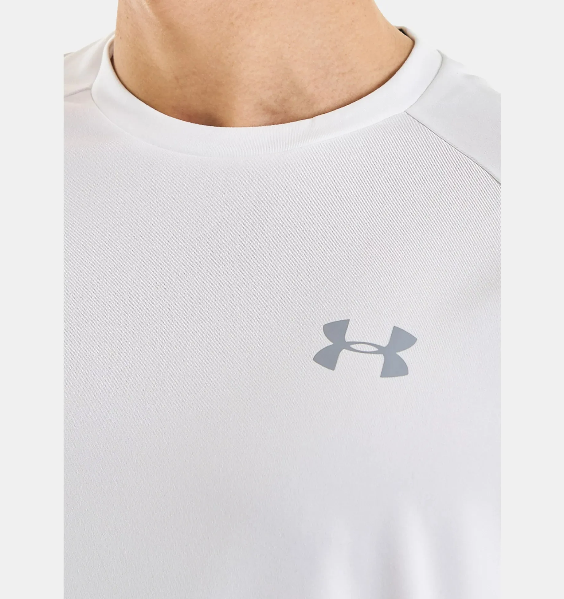 Under Armour crew neck workout t-shirts with short sleeves and logo design.